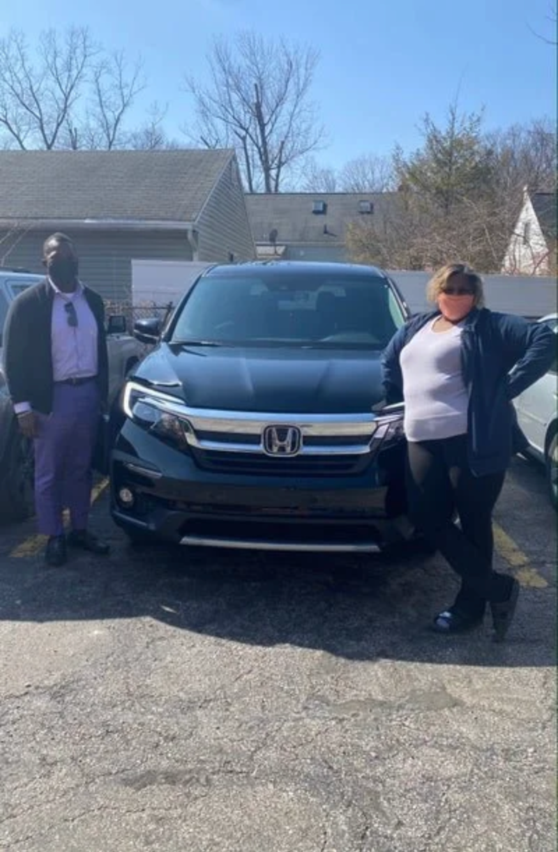 Happy MH3 Cars customer receiving their vehicle
